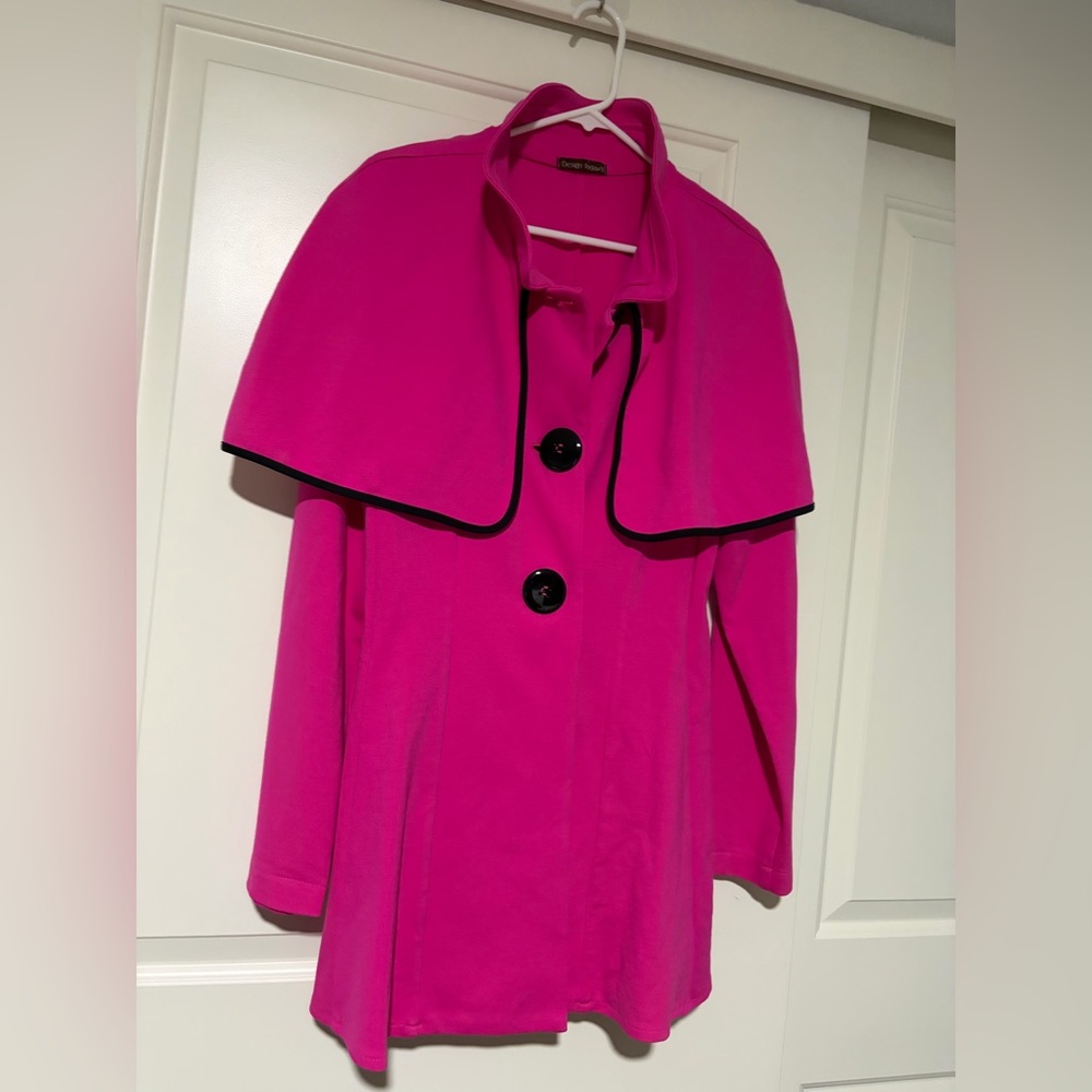 Design Today’s Vibrant Pink Cape Coat with Black Trim - Picture 6 of 7